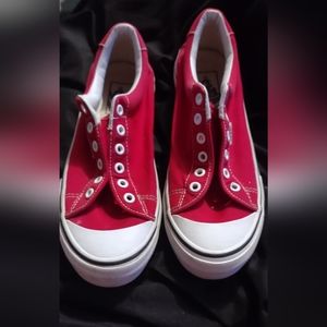 Never worn Vans size 7 in men's size 8.5 in women's